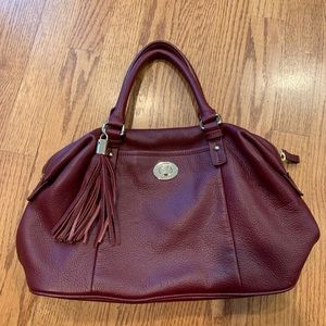 Womens purse. Only used twice. Burgundy color. Like brand new.